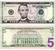 The front and Back of the new $5 bill were unveiled Thursday in Washington. The new bills will go into circulation sometime in the spring.