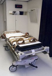 Florida's lethal injection gurney is shown in an undated handout photo taken in the redesigned death chamber that will accommodate either the electric chair or the gurney at Florida State Prison. Lethal injections were supposed to be the humane way to execute inmates and avoid the excruciating pain caused by firing squads, electric chairs and the hangman's noose. But many still argue the chemical cocktail amounts to cruel and unusual punishment.
