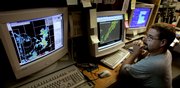 Walter Geiger III checks the radar at the Lakin airport as he works at the control center Aug. 28 for the Western Kansas Weather Modification program.