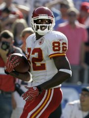Kansas City Chiefs receiver Dwayne Bowe looks back as he cruises into the end zone with a touchdown reception Sunday at San Diego.