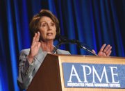 Speaker of the House Nancy Pelosi, D-Calif., addresses the annual meeting of the Associated Press Managing Editors in Washington. The House and the Senate will vote on bills that would shield reporters from revealing sources in some federal cases.