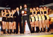 Billy Mitchell, center, accepts an award for his "Donkey Kong" skills in the documentary "The King of Kong: A Fistful of Quarters."