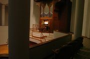 Michael Bauer, professor of organ and church music at KU, plays the organ at Bales Organ Recital Hall, which will be home to the Bales Artist Series. The new subscription series will bring four of the "greatest organists in the world" to play concerts, give lectures and conduct master classes.