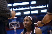 KU Senior forward Taylor McIntosh, of Wichita, talks with reporters Wednesday, in Allen Fieldhouse during the KU women's basketball team's media day.