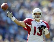 Arizona quarterback Kurt Warner tosses a pass during a Sept. 23 game against Baltimore. A season-ending injury to Matt Leinart makes Warner the starting quarterback for Sunday's game against Carolina.