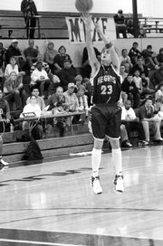 Chase Buford launches a shot during his junior year at Alamo Heights High in San Antonio, Texas. He didn't play as a senior because of mono.