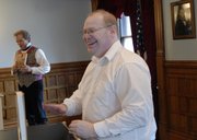 Tim Rues, left, portrays Kansas statesman Jim Lane in a "conversation" with Robert Collins, author of the book "Jim Lane: Scoundrel, Statesman, Kansan," Saturday at Watkins Community Museum of History, 1047 Mass.