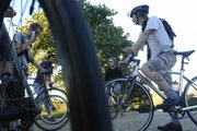 Friday Night Fixie Riders gather at the Campanile on the Kansas University campus. The rides commence at 6 p.m. the first, second and third Fridays of the month.