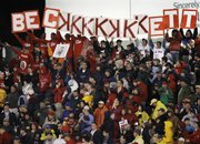 Boston Fans celebrate pitcher Josh Beckett's strikeout of Colorado's Brad Hawpe in the fourth inning of Boston's 13-1 Game 1 victory in the World Series Wednesday at Fenway Park in Boston.