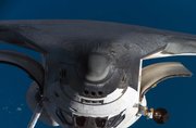 In this photo provided by NASA, the nose and part of the underside of the space shuttle Discovery are featured in this close-up image photographed by an Expedition 16 crew member during a backflip maneuver. The Ku-band antenna, instrumental in communications operations, is visible on the port side of the orbiter on Thursday.