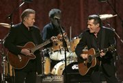 Don Henley, left, and Glenn Frey of the Eagles perform during the 41st annual Country Music Association Awards in Nashville, Tenn. Wednesday's performance at the CMA Awards show was a first for the group.