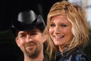Country singers Kristian Bush, left, and Jennifer Nettles of the music group Sugarland were named Duo of the Year.