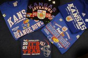 Jayhawk fans will have up to 30 styles of Orange Bowl T-shirts to choose from to support the KU football team. The university had about 17,500 tickets to the game available for fans.