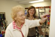 Lois Bushnell, left, works with occupational therapist Melanie Krumsick at Pioneer Ridge Assisted Living. Funding for Kansas nursing homes under Medicare Part A might be cut by $22 million over five years, which could hurt rehabilitation services.