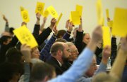 Clergy and lay members of the Episcopal Diocese of San Joaquin vote to split with the national denomination over disagreements about the role of gays and lesbians in the church Saturday at their annual convention in Fresno, Calif. The Fresno-based congregation is the first full diocese to secede because of a conservative-liberal rift that began decades ago and is now focused on whether the Bible condemns gay relationships.