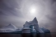 An iceberg melts off Ammassalik Island in Eastern Green-land in this file photo from July. A record amount of Greenland's ice sheet melted this summer, U.S. scientists are reporting this week in an ominous new sign of global warming.