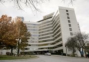 The main entrance to Rhode Island Hospital is seen in Providence, R.I. The hospital was fined $50,000 and reprimanded by the state Department of Health after its third instance of brain surgery performed on the wrong side.