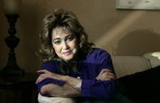 Cancer patient Becky Anderson is seen at her sister's home in Loomis, Calif. A plastic surgeon who has been in and out of rehab and botched an operation on Anderson has been accused of negligence.