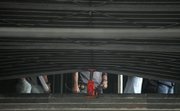 A hydraulic jack used by thieves to enter the Sao Paulo Museum of Art remains in the museum&squot;s door Thursday in Sao Paulo, Brazil. Thieves broke into the museum Thursday and made off with Pablo Picasso&squot;s "Portrait of Suzanne Bloch" and Candido Portinari&squot;s "O Lavrador de Cafe."