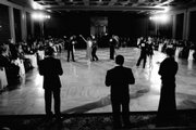 Dancers perform as judges mark their scores during the Grand National Dance Competition, which was last month in Miami Beach, Fla. Ballroom dancing is now known as DanceSport and could become the next big Olympic sport.