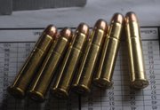 Shells for a Springfield Rifle show their size at almost 2 inches long, packing a strong recoil on the 19th century rifle.