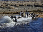 The Aquaplant Shredder - also known as "The Terminator" - cuts its way up the Lower Owens River, a waterway long diverted to provide drinking water for the city of Los Angeles. De Soto-based Masters Dredging designed and built the bladed boat, which recently helped clear vegetation to assist with Los Angeles&squot; ongoing river-restoration project.