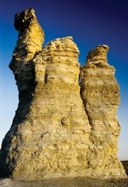 Castle Rock, a limestone bluff left behind from a vast inland sea thousands of years ago, was named, along with Monument Rock, one of the "8 Wonders of Kansas" by 24,000 voters across the country. This limestone outcropping got its name from the similarities in appearance it has to that of an old English castle.