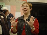 Cathy Crispino, Lawrence High School choral teacher, was pleasantly surprised Friday after being named the Kansas Music Educators Association's High School Choral Teacher of the Year.