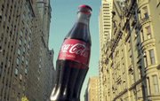 The Coca-Cola Co. provided this screenshot from an ad scheduled to run during Super Bowl XLII on Sunday. Advertisers are banking more than ever on the Super Bowl as the writers' strike affects hit TV shows.