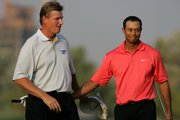 Tiger Woods, right, talks to Ernie Els after winning the 2006 Dubai Desert Classic. Els' three-year plan to overtake Woods as the world's No. 1 player hit a major snag Sunday when Woods won the '08 Desert Classic. Els hit into the water on the last hole, sinking his hopes for victory.