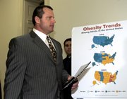 Roger Clemens arrives for a meeting with Rep. Diane Watson, D-Calif., on Tuesday. Clemens will testify at a Congressional steroids hearing today in Washington.