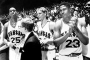 From left, KU's Danny Manning, team manager Bill Pope, Chris Piper and Archie Marshall celebrate a victory from the bench.