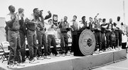 Kansas University's player and coaches celebrate in Memorial Stadium the day after they beat Oklahoma to win the 1988 NCAA men's basketball championship.