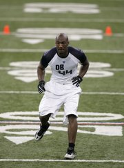 Former Kansas University defensive back Aqib Talib backpedals during a drill. Talib worked out in front of NFL scouts and coaches at the NFL Combine on Tuesday in Indianapolis.