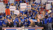 Kansas fans go wild as members of the ESPN College GameDay crew Rece Davis, left, Hubert Davis, Digger Phelps and Jay Bilas go live from James Naismith Court at Allen Fieldhouse. Students were allowed to enter around 8 a.m.