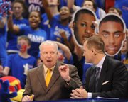 ESPN College GameDay crew members Digger Phelps, left, and Jay Bilas talk strategy live from James Naismith Court at Allen Fieldhouse.