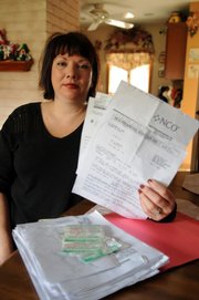 Kim Mullen cut up all her credit cards after she filed for bankruptcy in 1993. Since then, the Levittown, N.Y., resident has received a good credit rating. But in December, a debt collector contacted her, saying she had an unpaid card balance of $5,655 from 1992. With interest, the letter stated, the debt had grown to $19,400.