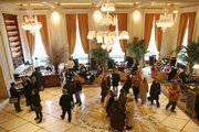 In this photo released by The Plaza, a view of the Champagne bar and reception area overlooking Fifth Avenue is seen during The Plaza hotel's reopening Saturday in New York. After a $400 million, two-year, lobby-to-roof renovation, The Plaza has been restored to its legendary status.