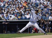 The Yankees' Andy Pettitte delivers against the Philadelphia Phillies. Pettitte threw two scoreless innings in the Yankees' 7-7 tie Sunday in Tampa, Fla.
