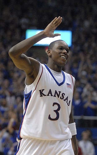 Russell Robinson thanks the fans as he exits the court for the final time in his KU career on Monday, March 3, 2008 at Allen Fieldhouse.