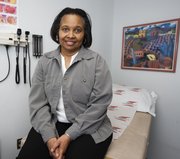 Geraldine Boggs, a Washington, D.C., nurse, poses for a photograph Monday in Washington. Boggs is a participant in a landmark government study about new cancer risks appearing in postmenopausal women after they stop taking hormones, while heart problems linked with the pills seem to fade. Boggs said women should pay attention to the new results.