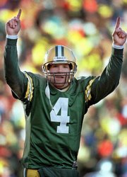 Green Bay quarterback Brett Favre reacts to a touchdown against Dallas in this 1997 photo. Favre, who threw 442 career touchdown passes, on Tuesday announced his retirement.