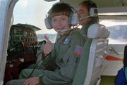 Vicki Van Meter is shown at age 11as she leaves on the first leg of a cross-country flight in this Sept. 20, 1993, file photo. Accompanying her is flight instructor Bob Baumgartner.