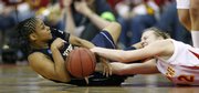 Iowa State's Amanda Nisleit, right, fights for a loose ball with Georgia Tech's Jill Ingram. Iowa State won, 58-55, Saturday in Des Moines, Iowa.