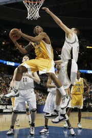 Siena's Alex Franklin (42) goes up for a shot against Vanderbilt. Siena upended the Commodores on Friday and will play another upstart underdog, Villanova, today. The winner will face Kansas University on Friday in Detroit.