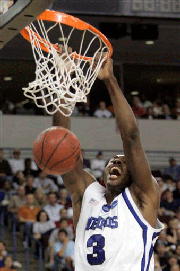 Memphis forward Joey Dorsey (3) stuffs the ball against Mississippi State in the first half of an NCAA men's basketball second-round South Regional game, Sunday, March 23, 2008, in North Little Rock, Ark.