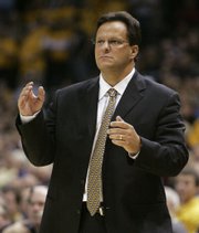 Marquette coach tom Crean watches his team during a December game against Coppin State. Indiana hired Crean on Tuesday as its new coach.