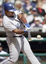 Kansas City's Jose Guillen singles and drives in a run against the Tigers. K.C. won, 4-1, Thursday in Detroit.