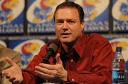 Kansas University basketball coach Bill Self, shown Thursday at a news conference at KU, has no plans to leave after winning the National Championship on Monday.