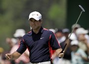 Trevor immelman reacts to a putt on the 17th green. Immelman fired a 68 during the second round of the Masters on Friday in Augusta, Ga.